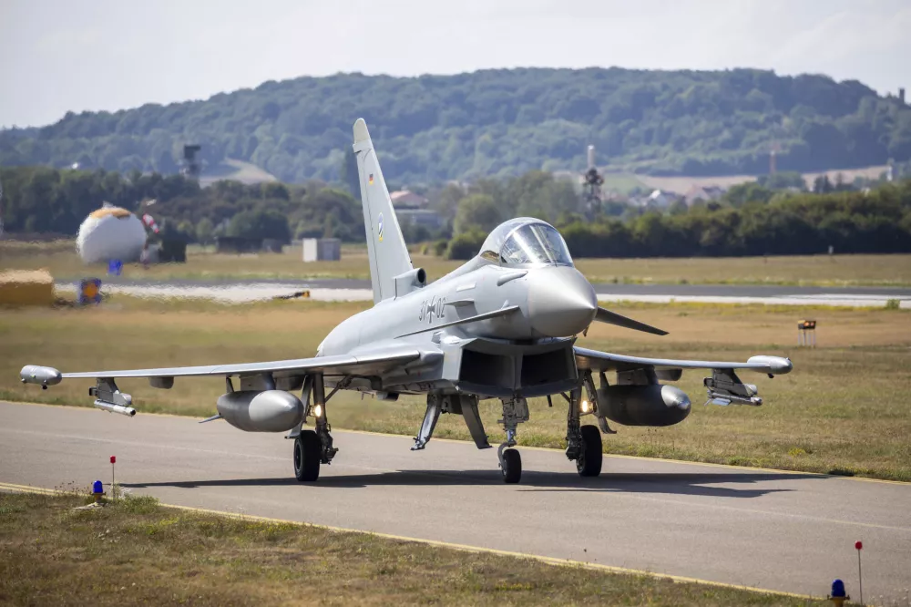 FILE - A German Eurofighter gets ready for takeoff at Neuburg Air Base in Neuburg An Der Donau, Germany, Monday Aug. 15, 2022. (Daniel Karmann/dpa via AP, File)