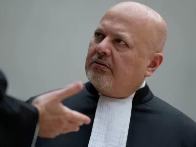 FILE PHOTO: Chief Prosecutor Karim Khan talks while waiting for former Philippine President Rodrigo Duterte to appear via video link before the International Criminal Court (ICC), in The Hague, Netherlands, Friday, March 14, 2025.   Peter Dejong/Pool via REUTERS/File Photo