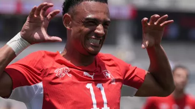Switzerland forward Dan Ndoye celebrates his goal during the first half of an international friendly soccer game against Australia Saturday, June 6, 2026, in San Diego. (AP Photo/Gregory Bull)