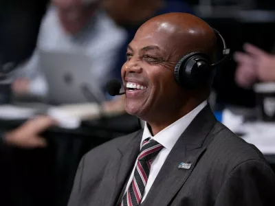 DAYTON, OHIO - MARCH 17: TV analyst Charles Barkley smiles prior to the first half in the First Four game between the NC State Wolfpack and the Texas Longhorns in the 2026 NCAA Men's Basketball Tournament at UD Arena on March 17, 2026 in Dayton, Ohio. Dylan Buell,Image: 1083948647, License: Rights-managed, Restrictions:, Model Release: no 