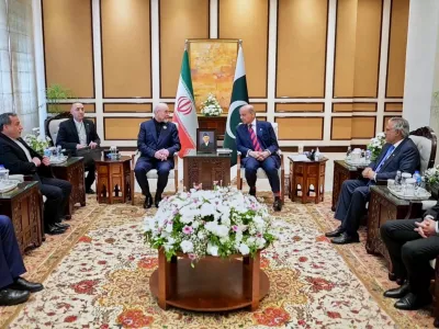 In this photo released by the Pakistan Prime Minister Office, visiting Iranian delegation headed by Iran's Parliament Speaker Mohammad Bagher Ghalibaf, third left, meet with Pakistani Prime Minister Shehbaz Sharif, in Islamabad, Pakistan, Saturday, April 11, 2026 (Pakistan Prime Minister Office via AP)