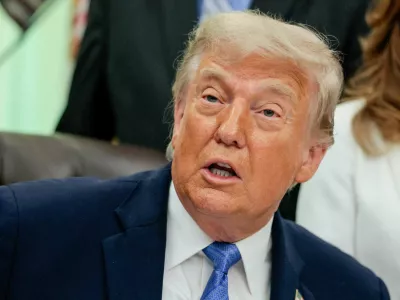 FILE PHOTO: U.S. President Donald Trump speaks in the Oval Office as he signs the Secure America Act, at the White House in Washington, D.C., U.S., June 10, 2026. REUTERS/Evan Vucci/File Photo