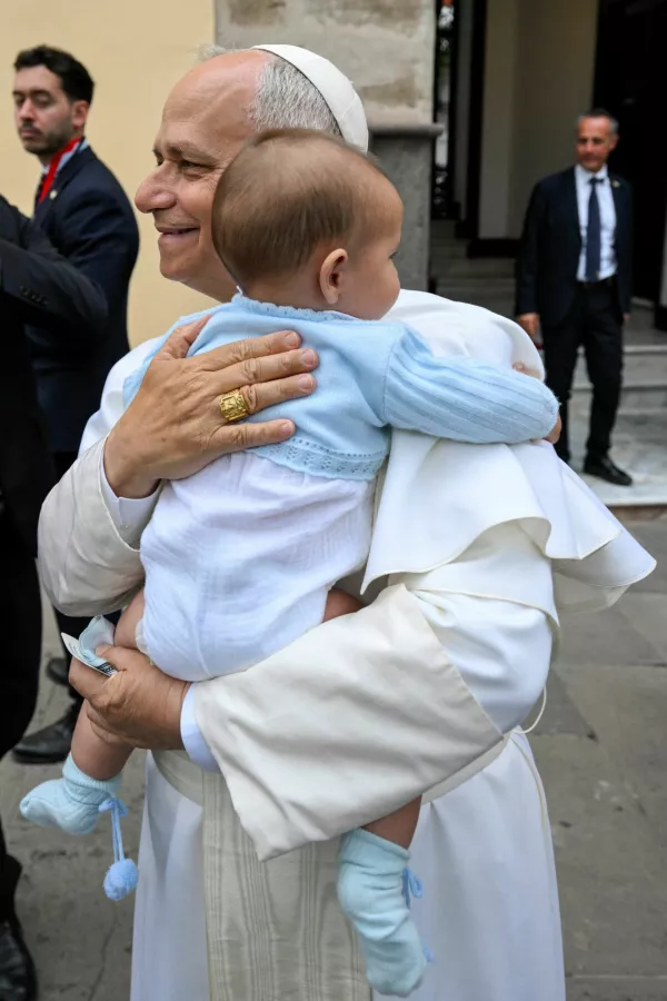 Pope Leo XIV hugs a child at the Episcopal Palace in Tenerife, Canary Islands, Spain, June 12, 2026, where he is meeting migrants and humanitarian organizations, as part of a seven-day apostolic journey to Spain, with visits to Madrid, Barcelona and the Canary Islands. Simone Risoluti/Vatican Media/&shy;Handout via REUTERS ATTENTION EDITORS - THIS IMAGE WAS PROVIDED BY A THIRD PARTY.