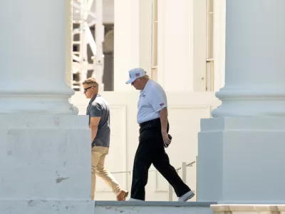 President Donald Trump walks to board his limousine at the North Portico of the White House, Saturday, June 13, 2026, in Washington. (AP Photo/Mark Schiefelbein)