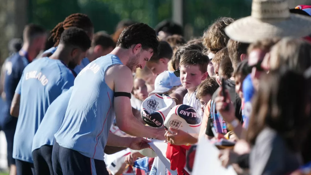 Soccer Football - FIFA World Cup 2026 - England Training - Swope Soccer Village, Kansas City, Missouri, U.S. - June 13, 2026 England's Declan Rice signs autographs during training IMAGN IMAGES via Reuters/Jay Biggerstaff