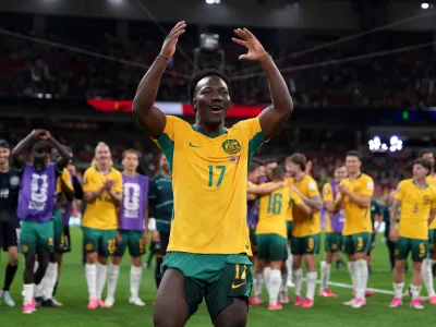 Australia's Nestory Irankunda gestures to the crowd after the World Cup Group D soccer match between Australia and Turkey in Vancouver, Canada, Saturday, June 13, 2026. (Ethan Cairns/The Canadian Press via AP)