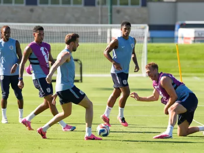 Members of the English national team practice for the World Cup soccer tournament in Kansas City, Mo., Saturday, June 13, 2026. (AP Photo/Charlie Riedel)