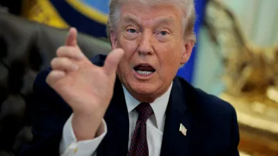 FILE PHOTO: U.S. President Donald Trump speaks during the signing ceremony for an executive order on mail ballots, in the Oval Office of the White House in Washington, D.C., March 31, 2026. REUTERS/Evan Vucci/File Photo