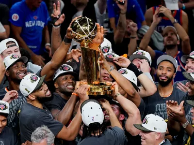 Jun 13, 2026; San Antonio, Texas, USA; The New York Knicks hoist the trophy after defeating the San Antonio Spurs in game five of the 2026 NBA Finals to win the 2026 NBA Championship at Frost Bank Center. Mandatory Credit: Dustin Safranek-Imagn Images   TPX IMAGES OF THE DAY