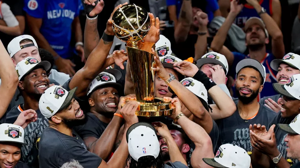Jun 13, 2026; San Antonio, Texas, USA; The New York Knicks hoist the trophy after defeating the San Antonio Spurs in game five of the 2026 NBA Finals to win the 2026 NBA Championship at Frost Bank Center. Mandatory Credit: Dustin Safranek-Imagn Images   TPX IMAGES OF THE DAY