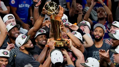 Jun 13, 2026; San Antonio, Texas, USA; The New York Knicks hoist the trophy after defeating the San Antonio Spurs in game five of the 2026 NBA Finals to win the 2026 NBA Championship at Frost Bank Center. Mandatory Credit: Dustin Safranek-Imagn Images   TPX IMAGES OF THE DAY
