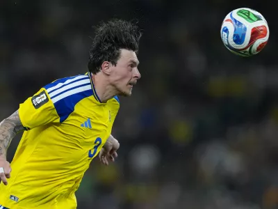 Sweden's Victor Lindelof (3) heads the ball during the World Cup Group F soccer match between Sweden and Tunisia in Guadalupe, near Monterrey, Mexico, Sunday, June 14, 2026. (AP Photo/Moises Castillo)