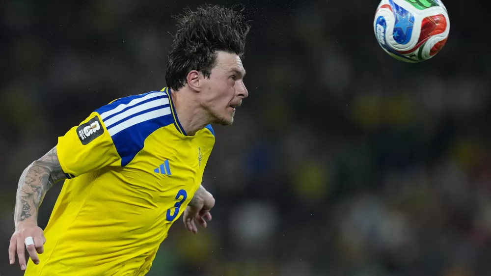Sweden's Victor Lindelof (3) heads the ball during the World Cup Group F soccer match between Sweden and Tunisia in Guadalupe, near Monterrey, Mexico, Sunday, June 14, 2026. (AP Photo/Moises Castillo)
