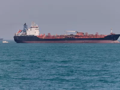 An oil tanker sits at anchor in the Strait of Hormuz off Bandar Abbas, Iran, Saturday, May 2, 2026.(Amirhosein Khorgooi/ISNA via AP)