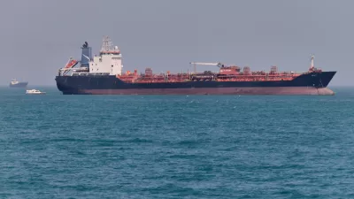 An oil tanker sits at anchor in the Strait of Hormuz off Bandar Abbas, Iran, Saturday, May 2, 2026.(Amirhosein Khorgooi/ISNA via AP)