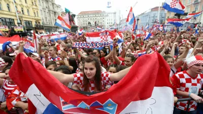 Soccer Football - World Cup - The Croatia team return from the World Cup in Russia - Zagreb, Croatia - July 16, 2018  Croatia fans await the arrival of the team at the main square in Zagreb  REUTERS/Antonio Bronic