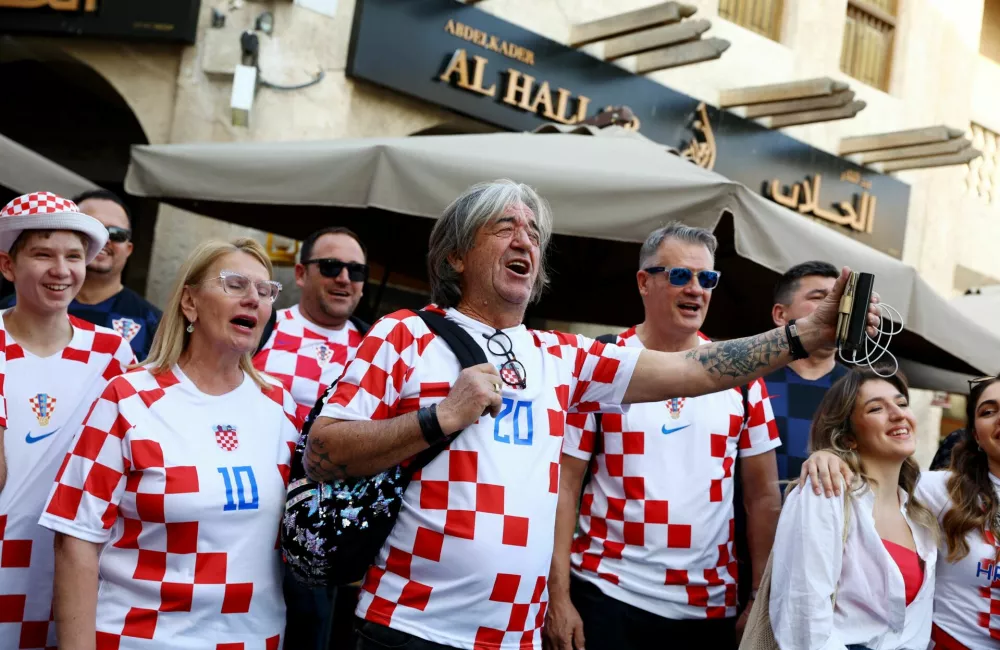 Soccer Football - FIFA World Cup Qatar 2022 - Fans in Souq Waqif - Doha, Qatar - December 13, 2022 Croatia fans ahead of the semi final Argentina v Croatia REUTERS/Bernadett Szabo
