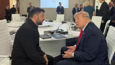 In this photo provided by the Press Service Of The President Of Ukraine, Ukrainian President Volodymyr Zelenskyy, left, and U.S. President Donald Trump speak during a meeting at the G7 summit in Evian-les-Bains, France, Tuesday, June 16, 2026. (Press Service Of The President Of Ukraine via AP)