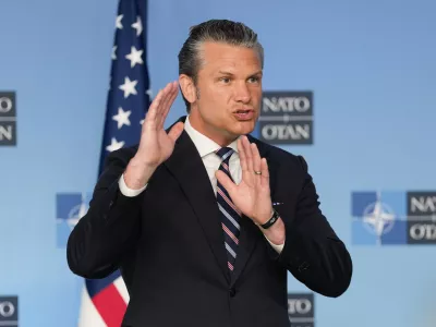 United States Defense Secretary Pete Hegseth speaks during a press statement on arrival for a meeting of NATO defense ministers at NATO headquarters in Brussels, Thursday, June 18, 2026. (AP Photo/Virginia Mayo)