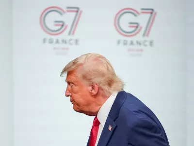 U.S. President Donald Trump leaves the stage after a media conference at the end of the G7 summit in Evian-les-Bains, France, Wednesday, June 17, 2026. (AP Photo/Vadim Ghirda)