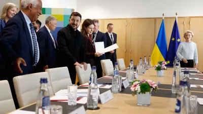 European Commission President Ursula von der Leyen, right, and European Council President Antonio Costa, left, meet with Ukraine's President Volodymyr Zelenskyy, center, on the sidelines of the EU summit in Brussels, Thursday, June 18, 2026. (AP Photo/Geert Vanden Wijngaert, Pool)