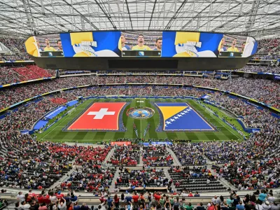 Swiss and Bosnian glags are seen on the pitch before the World Cup Group B soccer match between Switzerland and Bosnia in Inglewood, Calif., near Los Angeles, Thursday, June 18, 2026. (AP Photo/Jayne Kamin-Oncea)