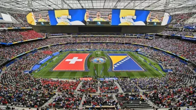 Swiss and Bosnian glags are seen on the pitch before the World Cup Group B soccer match between Switzerland and Bosnia in Inglewood, Calif., near Los Angeles, Thursday, June 18, 2026. (AP Photo/Jayne Kamin-Oncea)