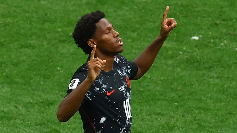Soccer Football - FIFA World Cup 2026 - Group B - Canada v Qatar - BC Place, Vancouver, Canada - June 18, 2026 Canada's Jonathan David celebrates scoring their sixth goal REUTERS/Albert Gea