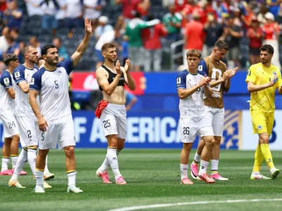 Soccer Football - FIFA World Cup 2026 - Group B - Switzerland v Bosnia and Herzegovina - Los Angeles Stadium, Inglewood, California, U.S. - June 18, 2026 Bosnia and Herzegovina's Sead Kolasinac and teammates applaud fans after the match REUTERS/Lisi Niesner