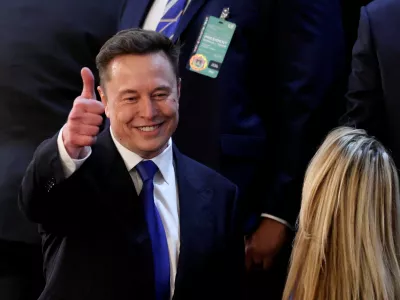 FILE PHOTO: Elon Musk gestures in the gallery on the day of U.S. President Donald Trump's speech to a joint session of Congress, in the House Chamber of the U.S. Capitol in Washington, D.C., U.S., March 4, 2025. REUTERS/Kevin Lamarque/File Photo