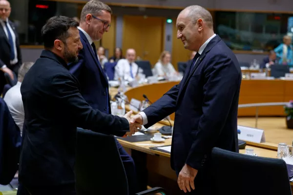 Ukraine's President Volodymyr Zelenskiy shakes hands with Bulgaria's Prime Minister Rumen Radev during a round table meeting at the EU summit in Brussels, Belgium, June 18, 2026. Geert Vanden Wijngaert/Pool via REUTERS