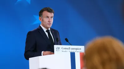 French President Emmanuel Macron speaks during a media conference at the EU summit in Brussels, Friday, June 19, 2026. (AP Photo/Marius Burgelman)