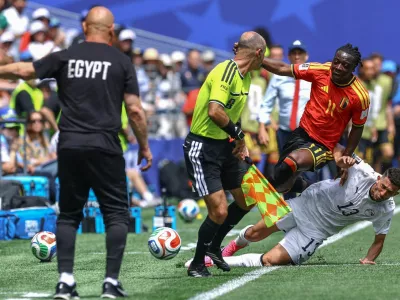 Soccer Football - FIFA World Cup 2026 - Group G - Belgium v Egypt - Seattle Stadium, Seattle, Washington, U.S. - June 15, 2026 Belgium's Jeremy Doku in action with Egypt's Ahmed Fatouh REUTERS/Albert Gea       SEARCH "WORLD CUP DAILY ONE" FOR THIS STORY. SEARCH "WIDER IMAGE" FOR ALL STORIES.     TPX IMAGES OF THE DAY