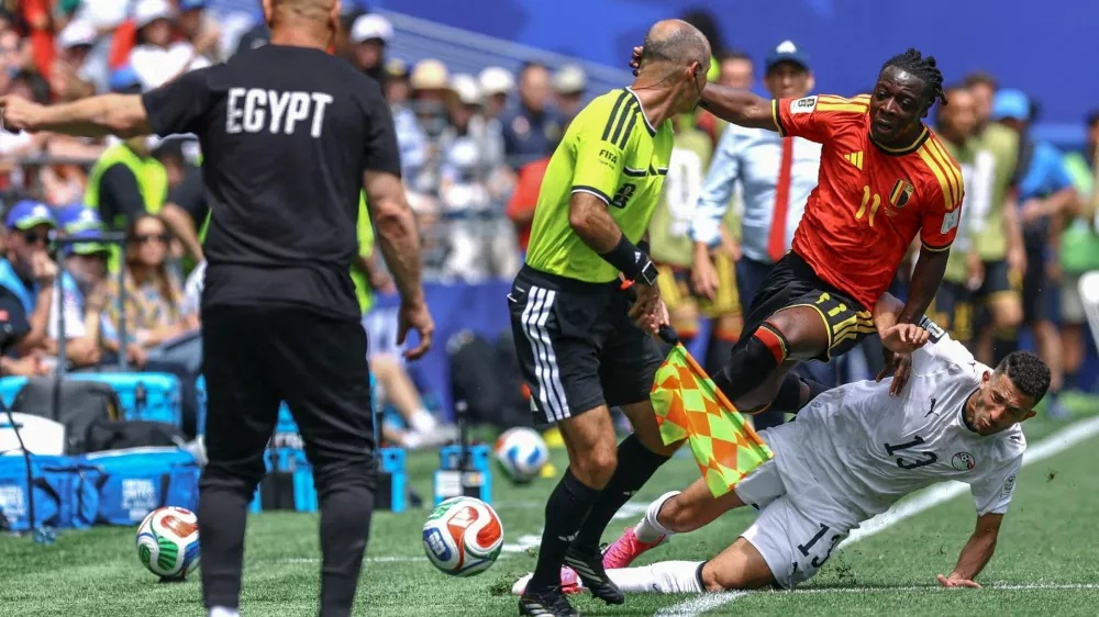 Soccer Football - FIFA World Cup 2026 - Group G - Belgium v Egypt - Seattle Stadium, Seattle, Washington, U.S. - June 15, 2026 Belgium's Jeremy Doku in action with Egypt's Ahmed Fatouh REUTERS/Albert Gea       SEARCH "WORLD CUP DAILY ONE" FOR THIS STORY. SEARCH "WIDER IMAGE" FOR ALL STORIES.     TPX IMAGES OF THE DAY