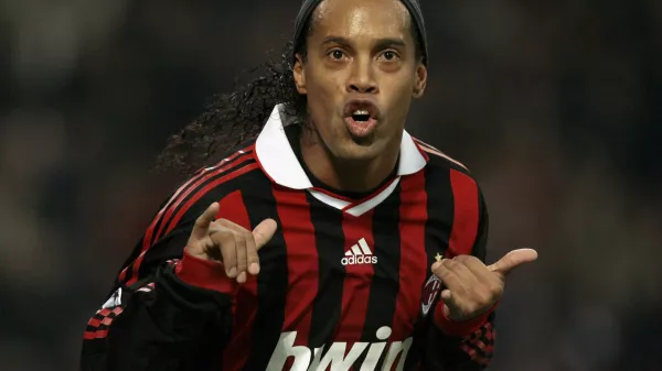 AC Milan's Ronaldinho celebrates after scoring against Real Madrid during their Champions League soccer match at the San Siro stadium in Milan November 3, 2009. REUTERS/Alessandro Garofalo (ITALY SPORT SOCCER)