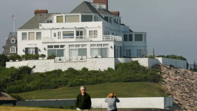 Visitors walk the lawn at Watch Hill Lighthouse and look towards the home of singer and songwriter Taylor Swift in the Watch Hill neighborhood in Westerly, Rhode Island, U.S., June 18, 2026. REUTERS/CJ Gunther