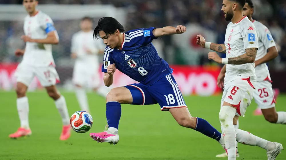 Japan's Ayase Ueda controls the ball during the World Cup Group F soccer match against Tunisia in Guadalupe, near Monterrey, Mexico, Saturday, June 20, 2026. (AP Photo/Matias Delacroix) CORRECTION: Corrects player at center to Japan's Ayase Ueda (18), instead of Takefusa Kubo.