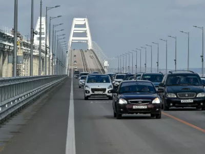 FILE - Cars and other vehicles drive on the Kerch&nbsp;Bridge connecting the Russian mainland and the Crimean&nbsp;Peninsula on&nbsp;Thursday, Feb. 23, 2023. &nbsp;(AP Photo, File)