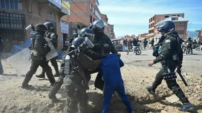 Police intervene in clashes between blockaders and residents, after Bolivian President Rodrigo Paz declared a nationwide state of emergency following weeks of violence and blockades, in El Alto, Bolivia, June 20, 2026. REUTERS/Claudia Morales