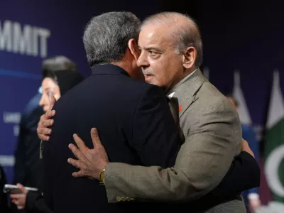 Iran's Foreign Minister Abbas&nbsp;Araqchi, left,&nbsp;and Pakistan's Prime Minister Shehbaz Sharif greet each other before the start of a quadrilateral meeting between the U.S., Iran, Pakistan, and Qatar, at the B&uuml;rgenstock Resort in Obbuergen, Switzerland, Sunday, June 21, 2026. (Nathan Howard/Pool Photo via AP)