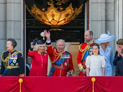 FILE PHOTO: Britain's King Charles, Queen Camilla, Prince William, Kate, Princess of Wales, Prince George, Princess Charlotte, Prince Louis, Anne, Princess Royal, and other officials appear on the balcony of Buckingham Palace during the Trooping the Colour parade to honour Britain's King Charles, as part of the official birthday celebrations, in London, Britain, June 13, 2026. REUTERS/Chris J. Ratcliffe/File Photo