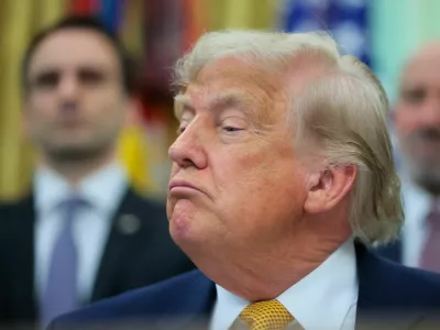 U.S. President Donald Trump looks on as he speaks to reporters before signing two executive orders regarding quantum computing, in the Oval Office at the White House in Washington, D.C., U.S., June 22, 2026. REUTERS/Jonathan Ernst