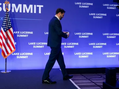 U.S. Vice President JD Vance walks after speaking to members of the media at the Buergenstock Resort Lake Lucerne, after the U.S. and Iran held high-level talks at the Lake Lucerne Summit, near Stansstad, Switzerland, June 22, 2026. REUTERS/Nathan Howard/Pool REFILE - QUALITY REPEAT