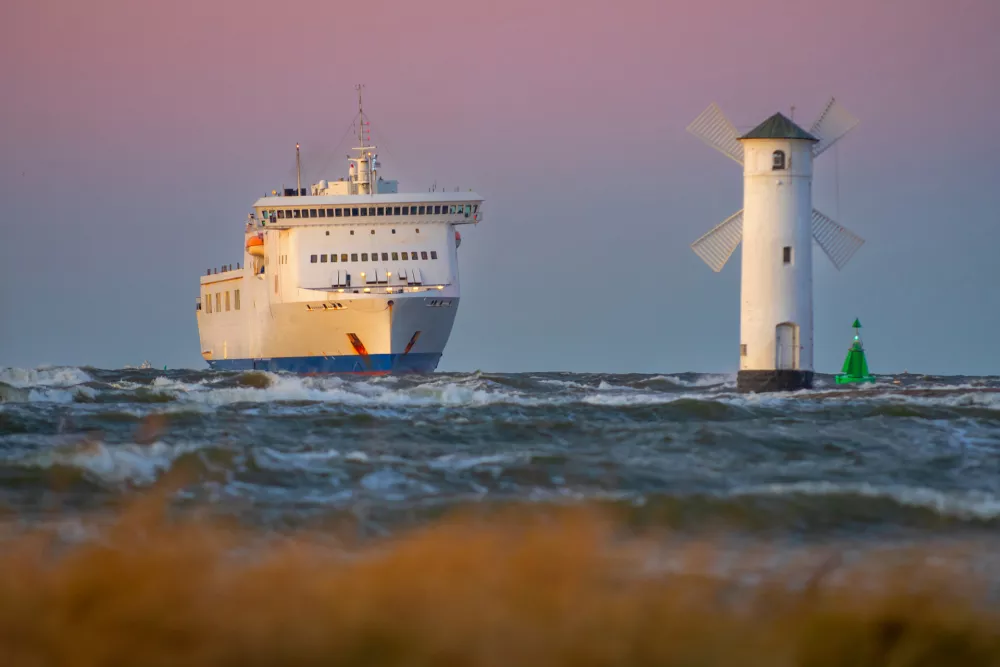 Cargo ship on a Baltic Sea in Swinoujscie town, West Pomerania region of Poland