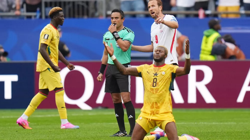 Soccer Football - FIFA World Cup 2026 - Group L - England v Ghana - Boston Stadium, Foxborough, Massachusetts, U.S. - June 23, 2026 Ghana's Kwasi Sibo celebrates as England's Harry Kane talks to referee Said Martinez after the match IMAGN IMAGES via Reuters/David Butler Ii