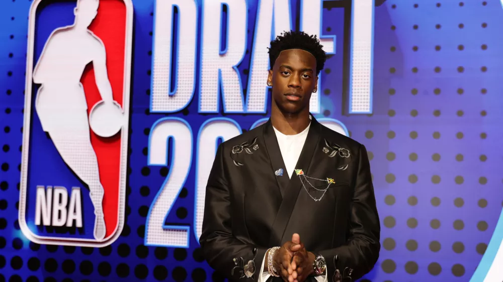 AJ Dybantsa arrives for the first round of the NBA basketball draft Tuesday, June 23, 2026, in New York. (AP Photo/Adam Hunger)