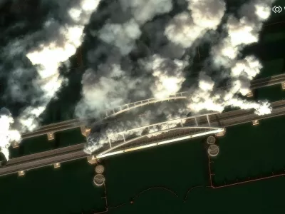 A satellite image shows smoke rising from Crimea Bridge, amid Russia-Ukraine conflict, Crimea, June 22, 2026. Vantor/Handout via REUTERS. THIS IMAGE HAS BEEN SUPPLIED BY A THIRD PARTY. NO RESALES. NO ARCHIVES. MANDATORY CREDIT. DO NOT OBSCURE LOGO.
