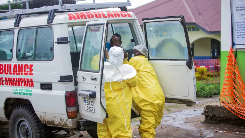 FILE PHOTO: Congolese health workers receive a patient at the Rwampara General Hospital as authorities intensify efforts to contain a new Ebola outbreak involving the Bundibugyo strain outbreak in Rwampara outside Bunia, Ituri province, Democratic Republic of Congo, May 21, 2026. REUTERS/Stringer/File Photo
