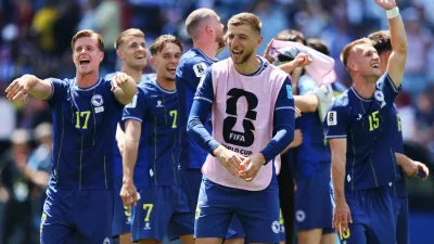 Soccer Football - FIFA World Cup 2026 - Group B - Bosnia and Herzegovina v Qatar - Seattle Stadium, Seattle, Washington, U.S. - June 24, 2026 Bosnia and Herzegovina's Dzenis Burnic, Amar Memic and Jovo Lukic celebrate after the match IMAGN IMAGES via Reuters/Blake Dahlin