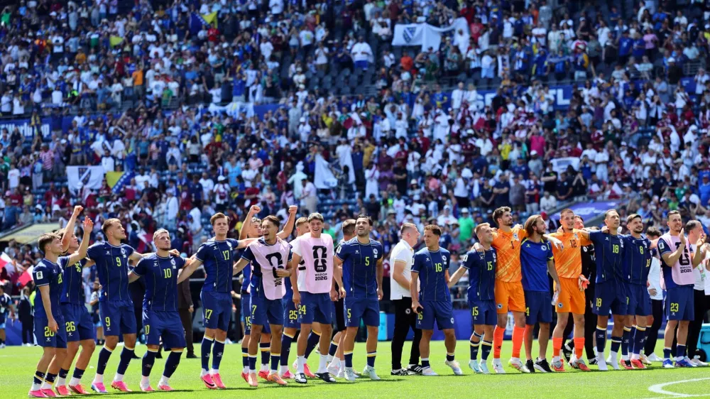 Soccer Football - FIFA World Cup 2026 - Group B - Bosnia and Herzegovina v Qatar - Seattle Stadium, Seattle, Washington, U.S. - June 24, 2026 Bosnia and Herzegovina players celebrate after the match IMAGN IMAGES via Reuters/Blake Dahlin